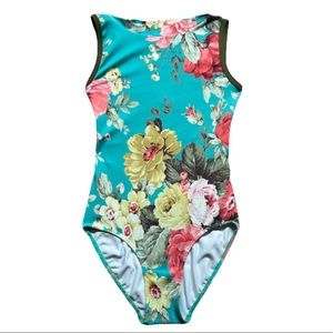Beautiful floral elevé leotard in excellent condition, no visible signs of wear.